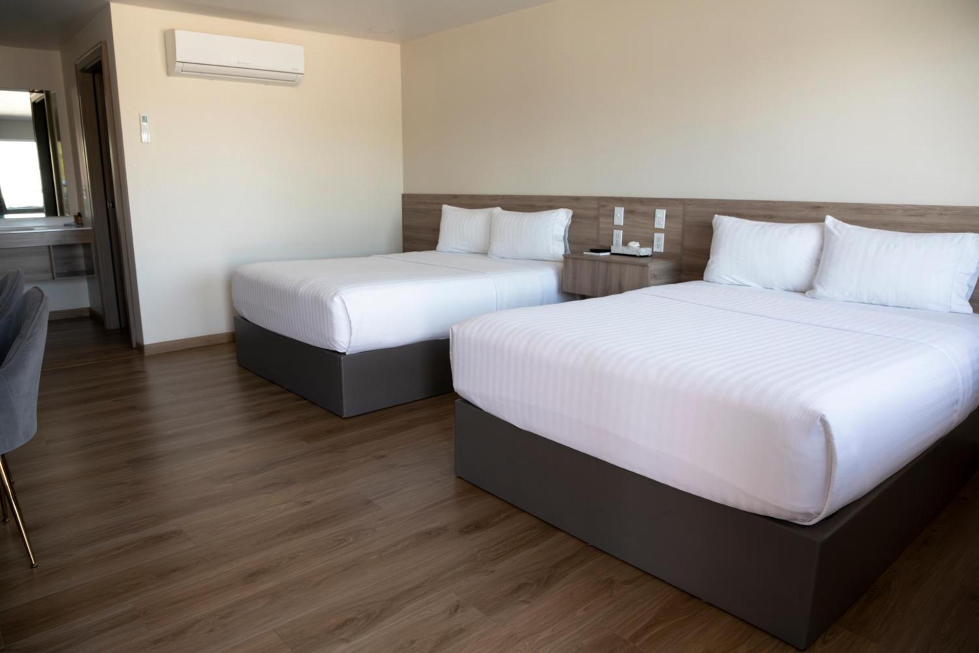 La Huerta Inn & Suites Cuauhtémoc Екстериор снимка